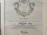 a close up of a certificate with a wax seal on it