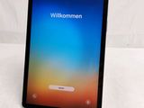 an image of a tablet with a wikommen screen on it