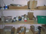 many boxes and boxes on the shelves in the room
