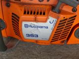 a close up of a chainsaw with a sticker on it