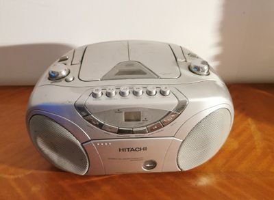 a radio that is sitting on a wooden table