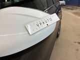 a sticker that says vaunto on the hood of a car
