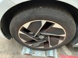a close up view of a tire on a car
