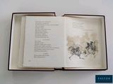 an open book with a picture of a horse drawn on it