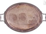 a silver tray with a handle on a white surface