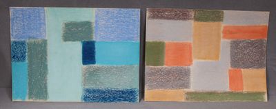 two paintings of different colors are on a gray surface