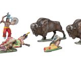 four figurines of different types of animals on a white background