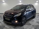 a picture of a black car parked in a garage