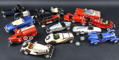 a lot of toy cars that are sitting on a table