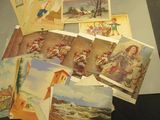 a pile of old postcards sitting on a table