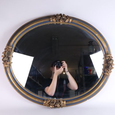 a man taking a picture of himself in a mirror