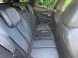 the back seats of a car are empty in the back of the car