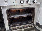 an oven that has some food inside of it