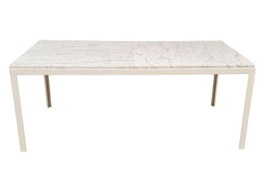 a white marble top dining table with metal legs