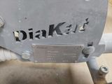 a close up of a metal sign on a machine