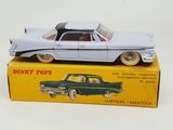 a toy car that is sitting on top of a box