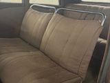 a brown seat in the back of a car