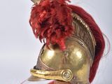 a helmet with a red mohawk on top of it