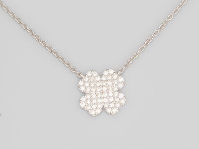 a diamond flower pendant on a chain