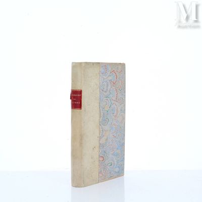 a book that is sitting on a white table