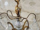 a chandelier hanging from the ceiling in a room