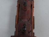 a small toy train that is sitting on a table