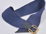 navy blue woven belt with gold buckle on white background