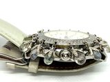 a watch that is sitting on top of a belt
