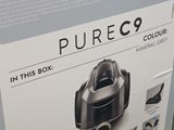 a box that has a vacuum cleaner inside of it