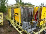 a yellow trailer with a bunch of yellow signs on it