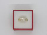 an image of a diamond ring in a red box on a white surface