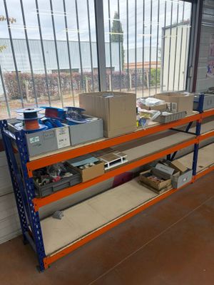 many boxes and boxes on the shelves in the warehouse