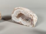 two donuts that have been cut in half on a table