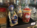 many vases on display on a shelf in a glass case