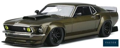 the toy car is green and has black rims on it