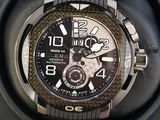 a close up of a watch in a black case