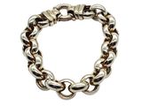 a close up of a chain bracelet on a white background