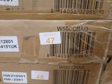 several boxes of packages are stacked on top of each other in a warehouse