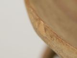a close up view of a wooden table with a white background