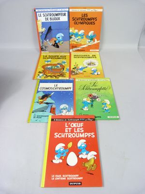 six livres pour enfants sont alignés sur une surface blanche