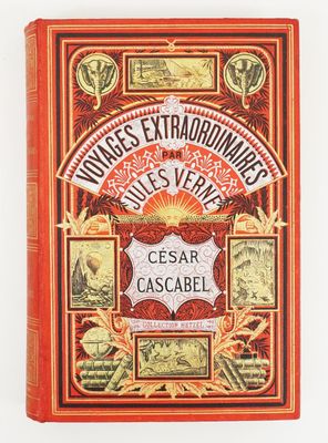un vieux livre à la couverture rouge et aux lettres dorées