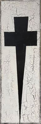 a black and white picture of a cross painted on a wall