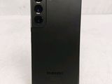 the back of a black samsung galaxy s20 with a camera on top of it