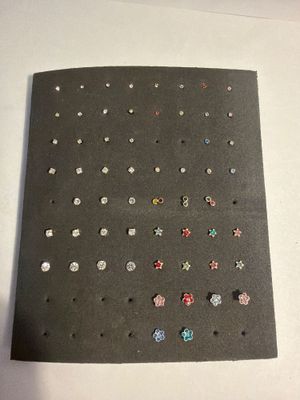 a picture of a bunch of studs on a piece of paper