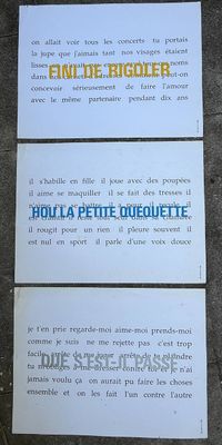three different types of business cards sitting on the ground