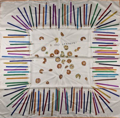 a white table cloth with a picture of donuts on it