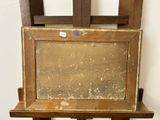 a picture of an easel with a painting on it