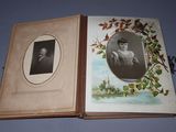 an old book with a picture of a man and a woman on it