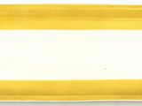 yellow rectangular plate with a white border on a white background