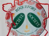 the poster for the roquefort society is displayed on the wall